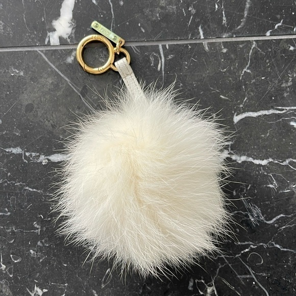 Fendi Handbags - FENDI ivory white fur pouf Pompom bag charm